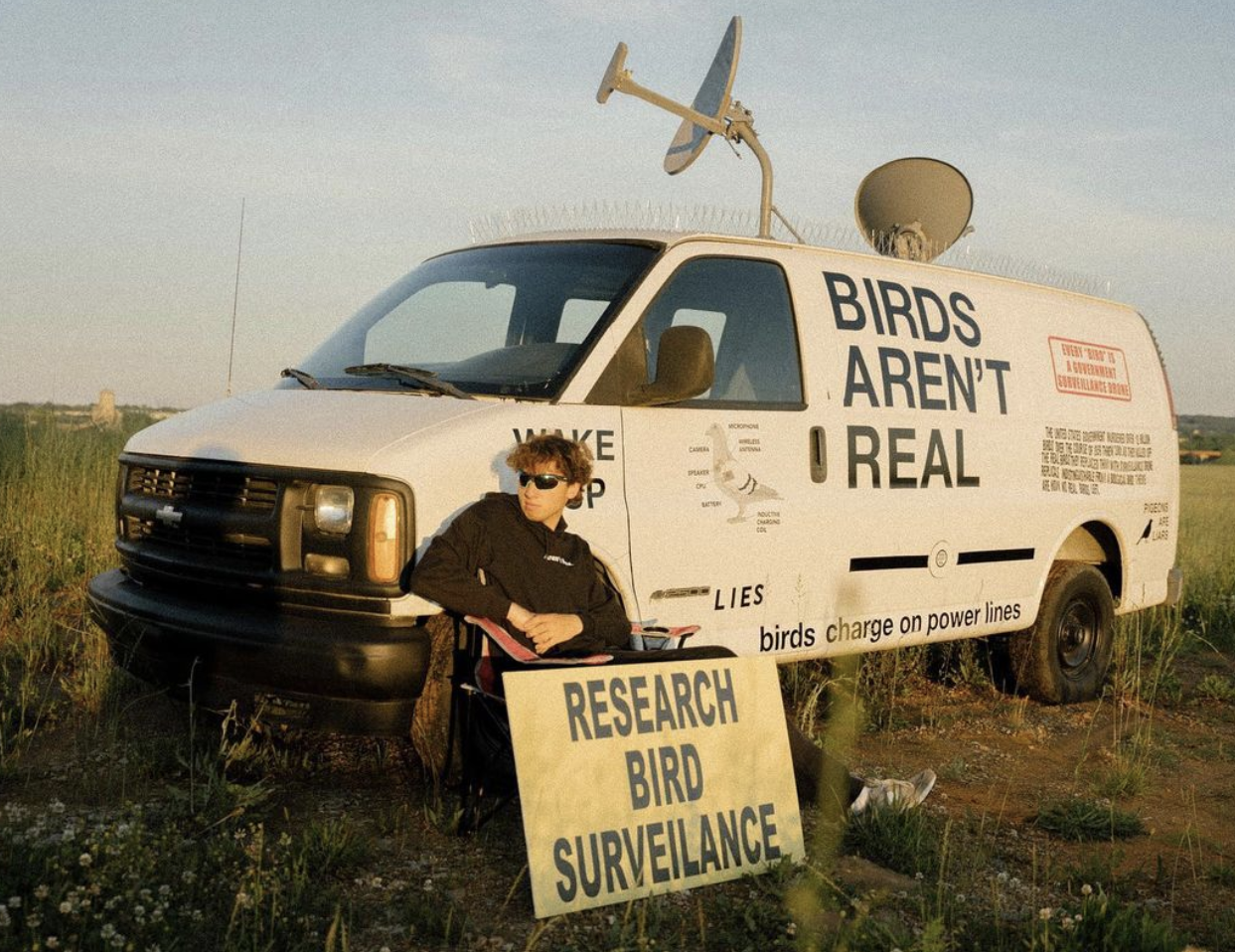 Peter McIndoe and his Bird Aren't Real van
